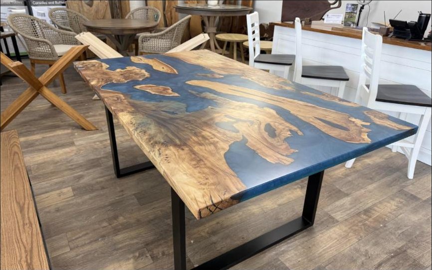 70 by 40 blue epoxy river dining table on industrial base